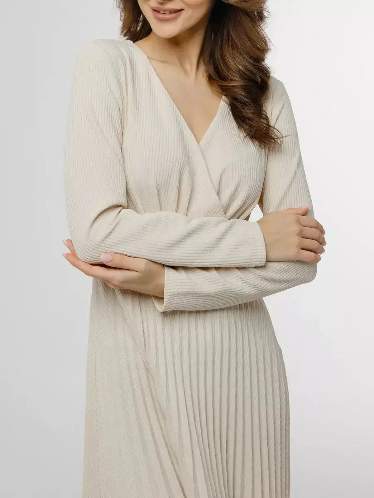 Ivory Grace Midi Dress featuring a V-neckline and pleated design, perfect for weddings and formal events.