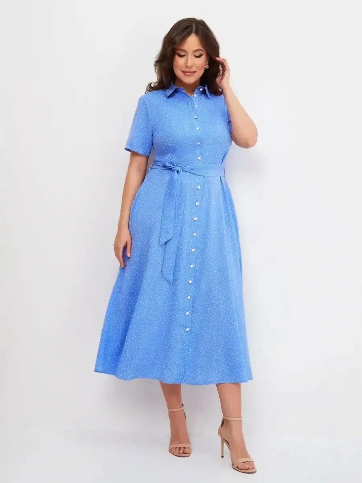 Light blue Skyline Dot Midi Dress with white polka dots, V-neckline, and button front, perfect for summer occasions.