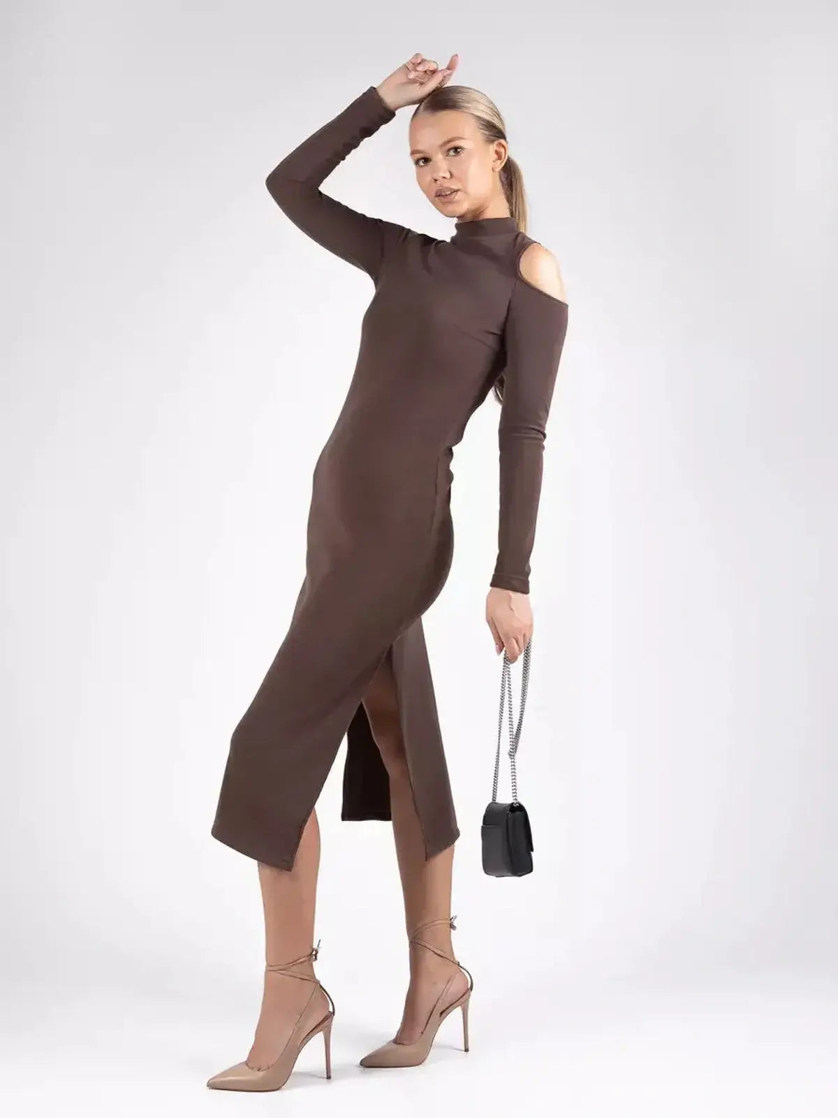 Midi Dress Élan featuring a sleek sculpted silhouette and bold shoulder cut-outs, perfect for summer and wedding guest styles.