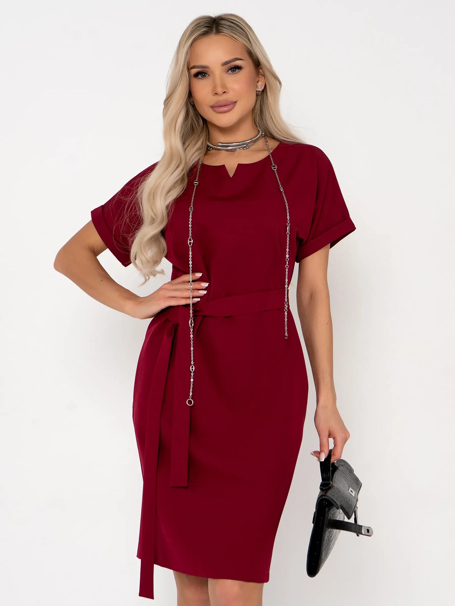Elegant crimson mini dress featuring a structured silhouette, short sleeves, and detachable belt, perfect for formal occasions.
