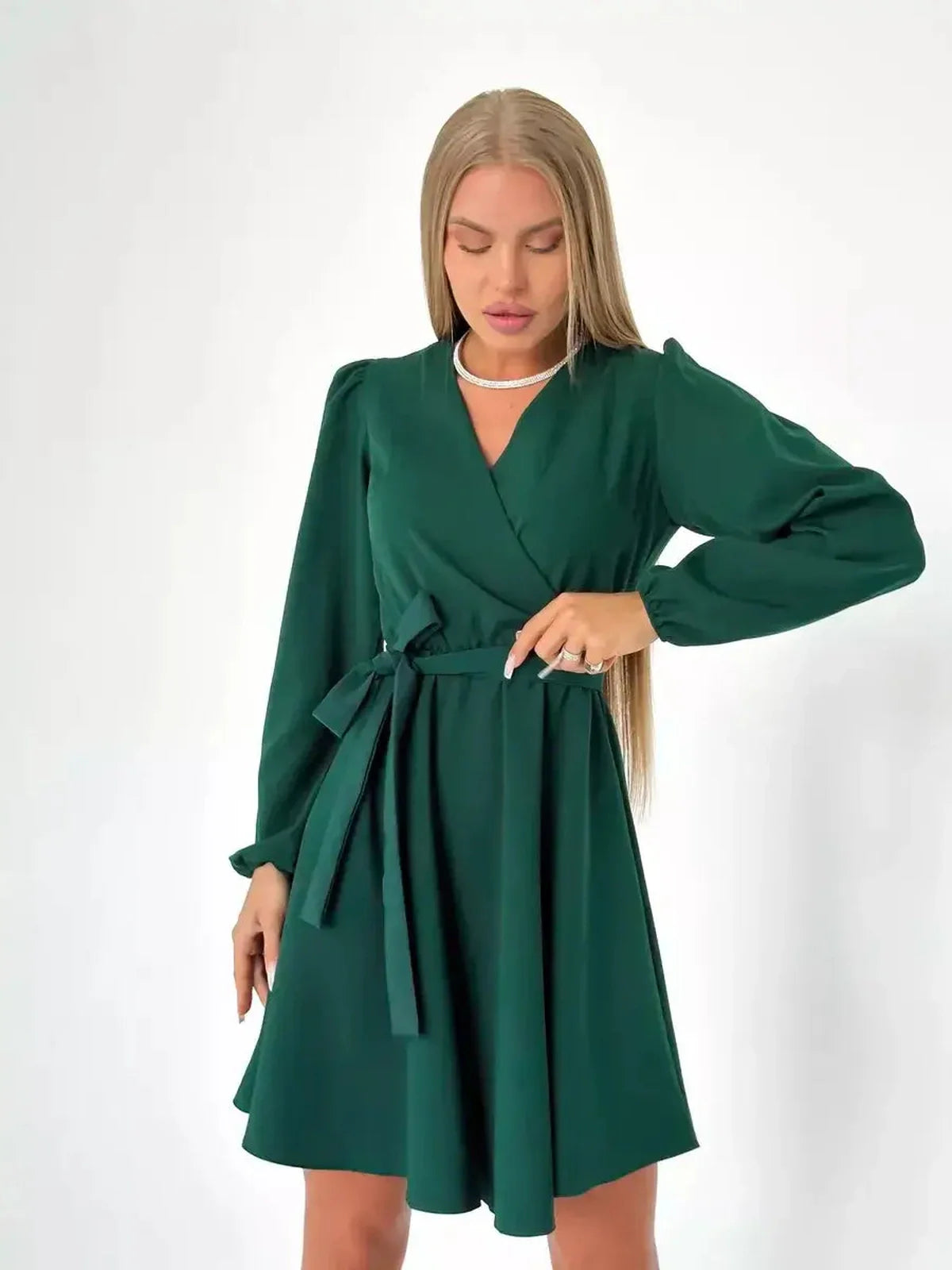 Emerald Charm mini dress featuring a wrap design and V-neckline, ideal for weddings, proms, and formal occasions.