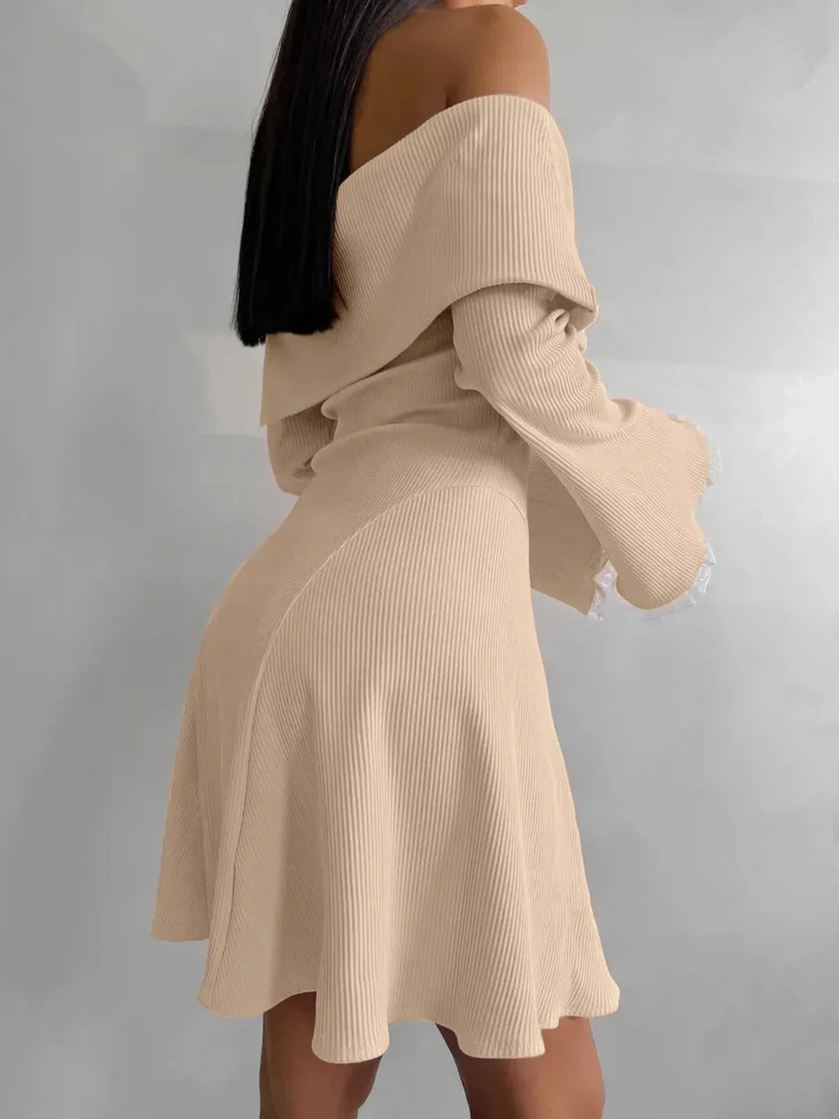 Beige Muse Mini Dress featuring off-shoulder silhouette, flared skirt, and lace-trimmed sleeves, perfect for summer and formal occasions.