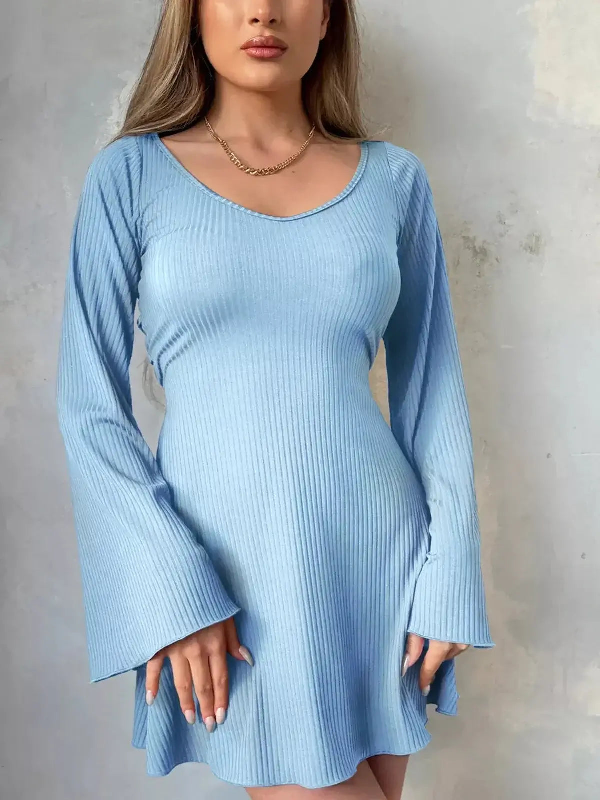 Sky Flare Mini Dress in light blue with flared sleeves, perfect for summer events and casual gatherings.