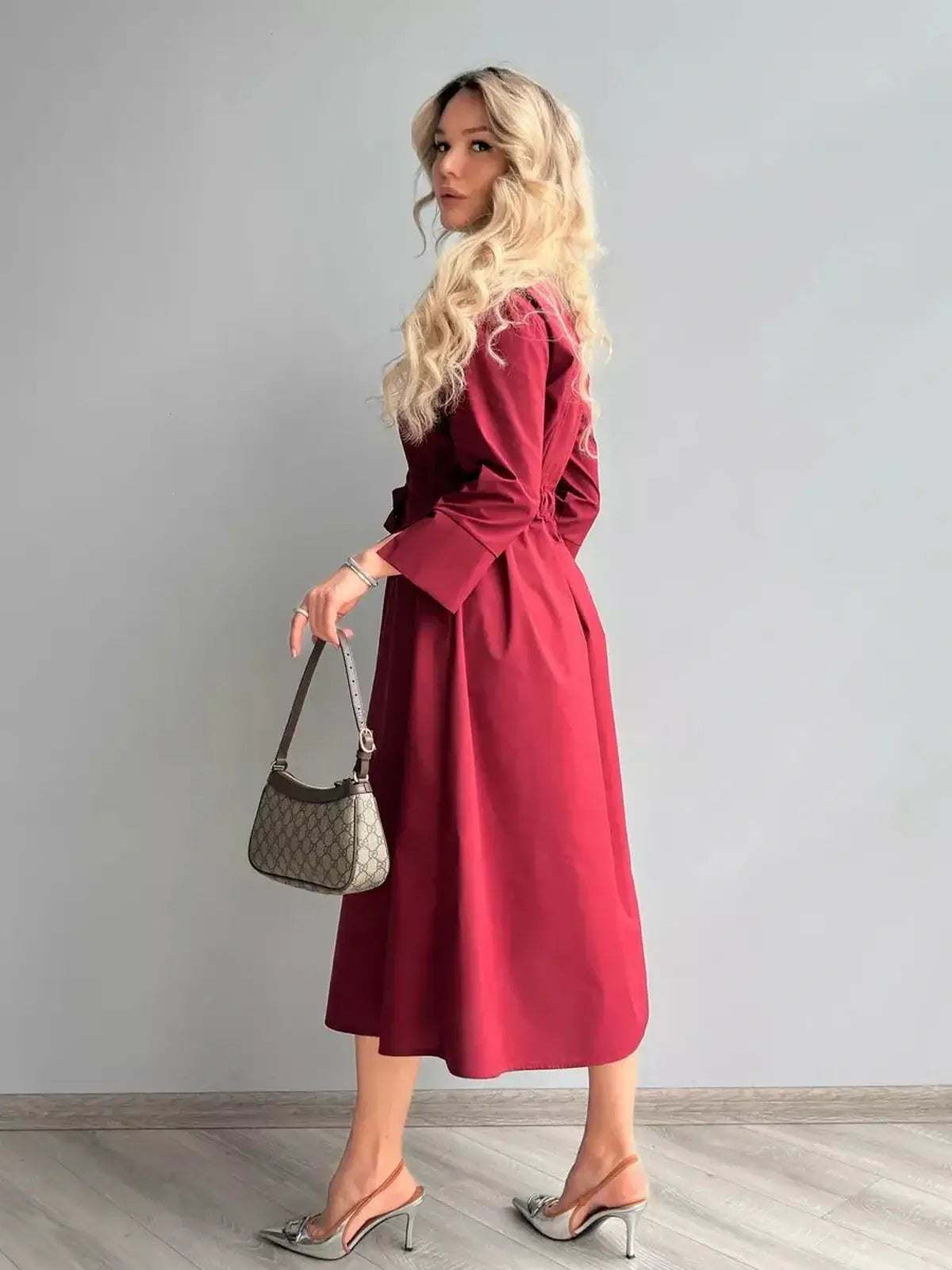 Burgundy Grace Midi Dress showcasing a polished A-line silhouette and stylish tie belt, perfect for weddings and formal occasions.