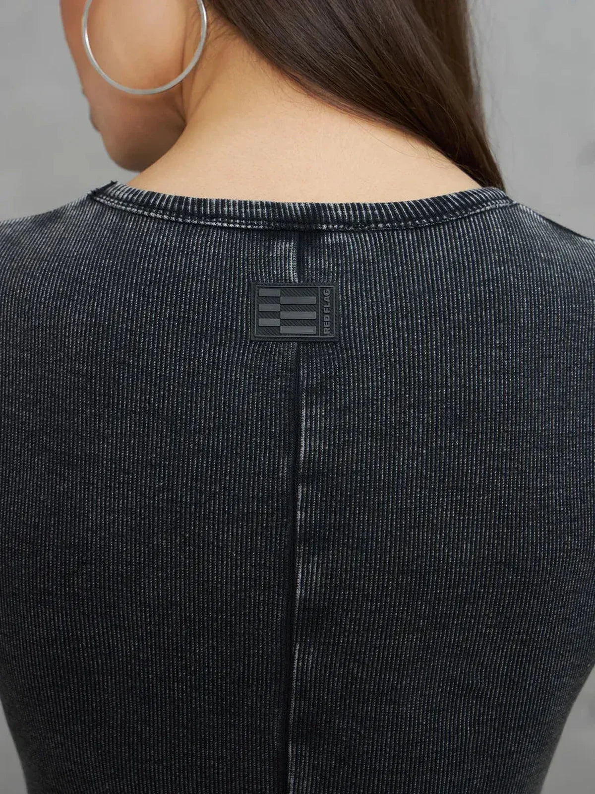 Back view of the Graphite Form Maxi Dress showcasing its soft stretch cotton and minimalist design details.