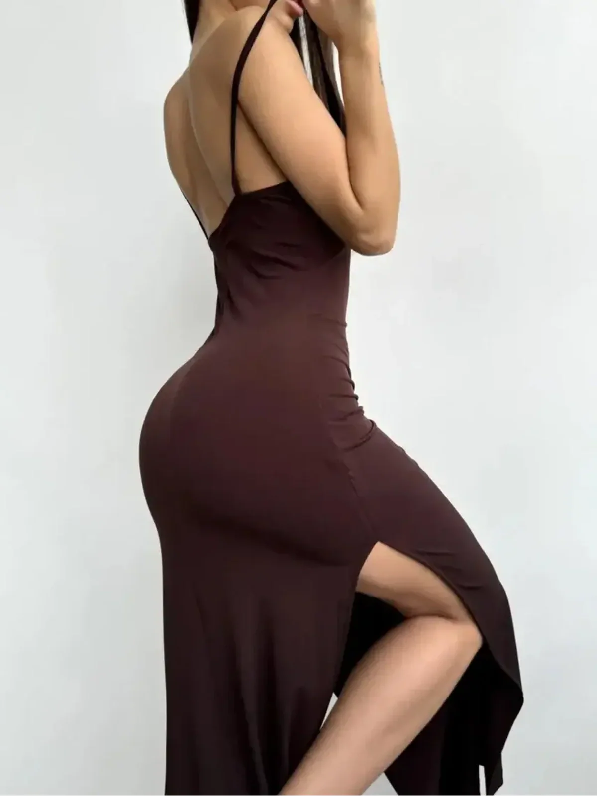 Noir Muse Midi Dress in deep chocolate satin featuring a seductive side slit and elegant fit, ideal for evening events.