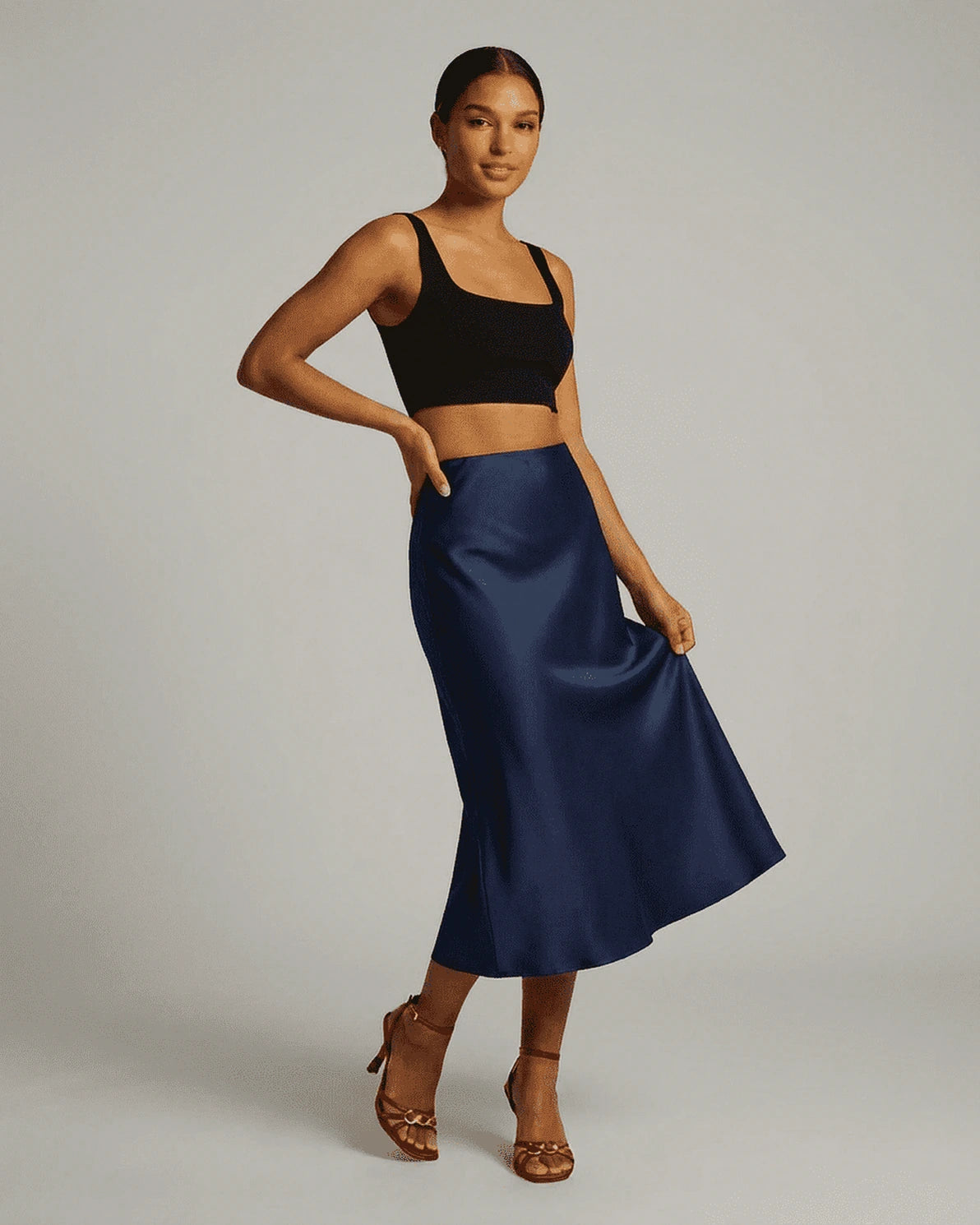Astra Midi Skirt – Navy Satin midi skirt, front view by Slimona