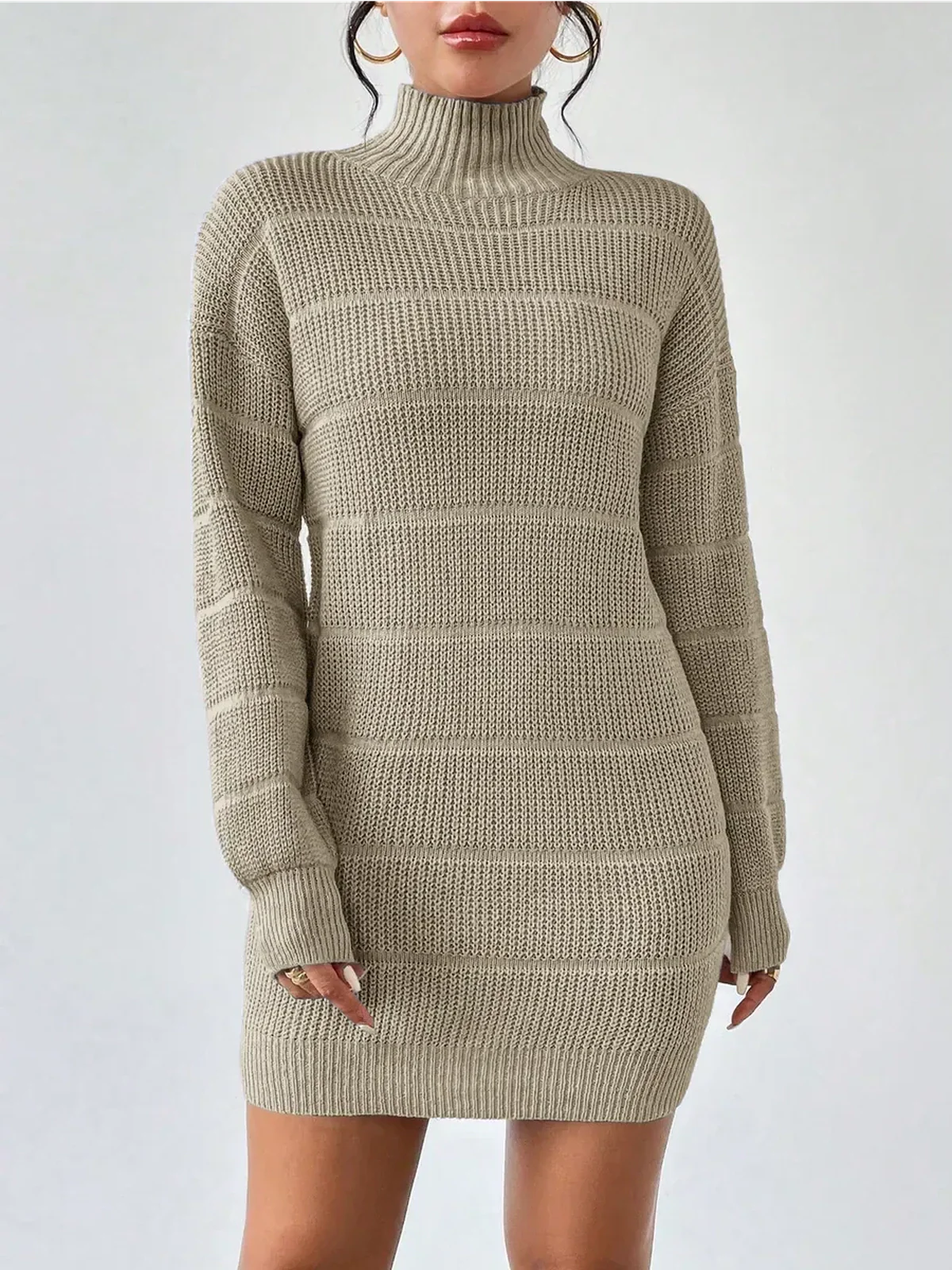 Beige long sleeve knit mini dress with ribbed texture and mock neck, perfect for winter occasions.