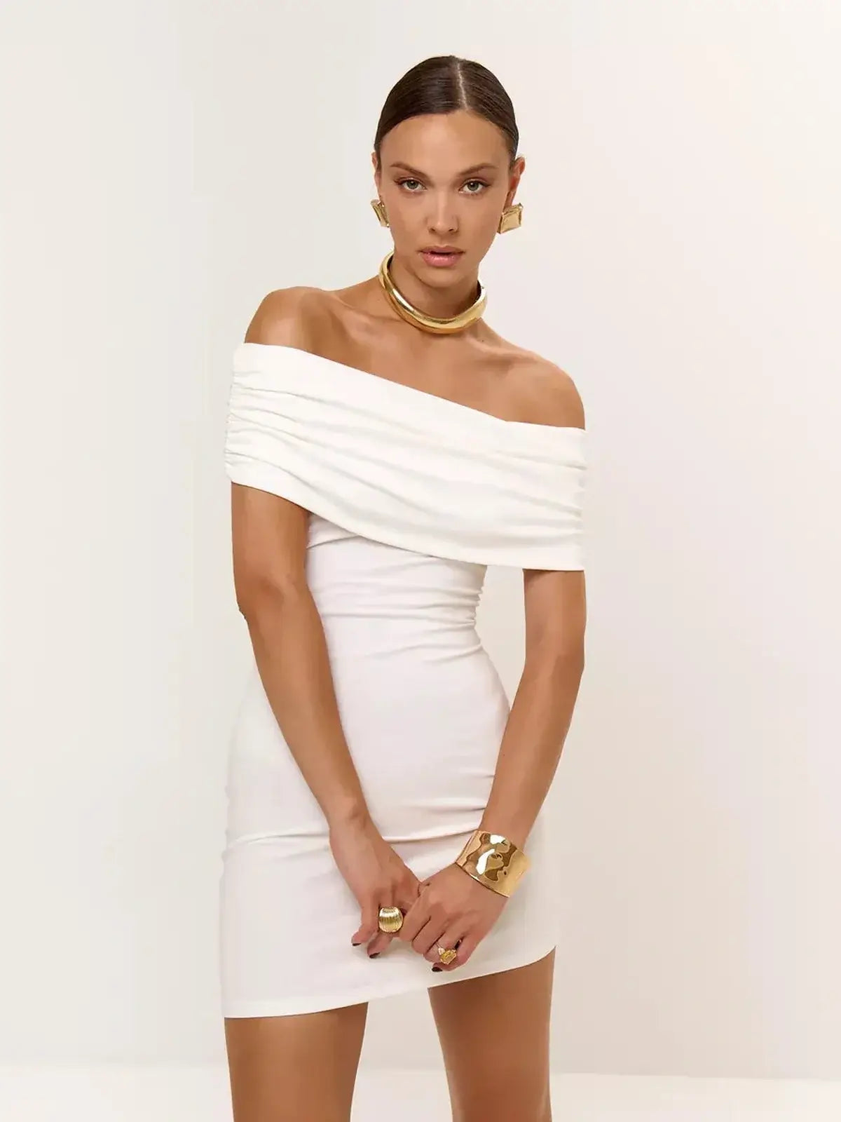 Ivory Sculpt off-shoulder mini dress, perfect for weddings, parties, and summer events. Elegant and breathable white dress.