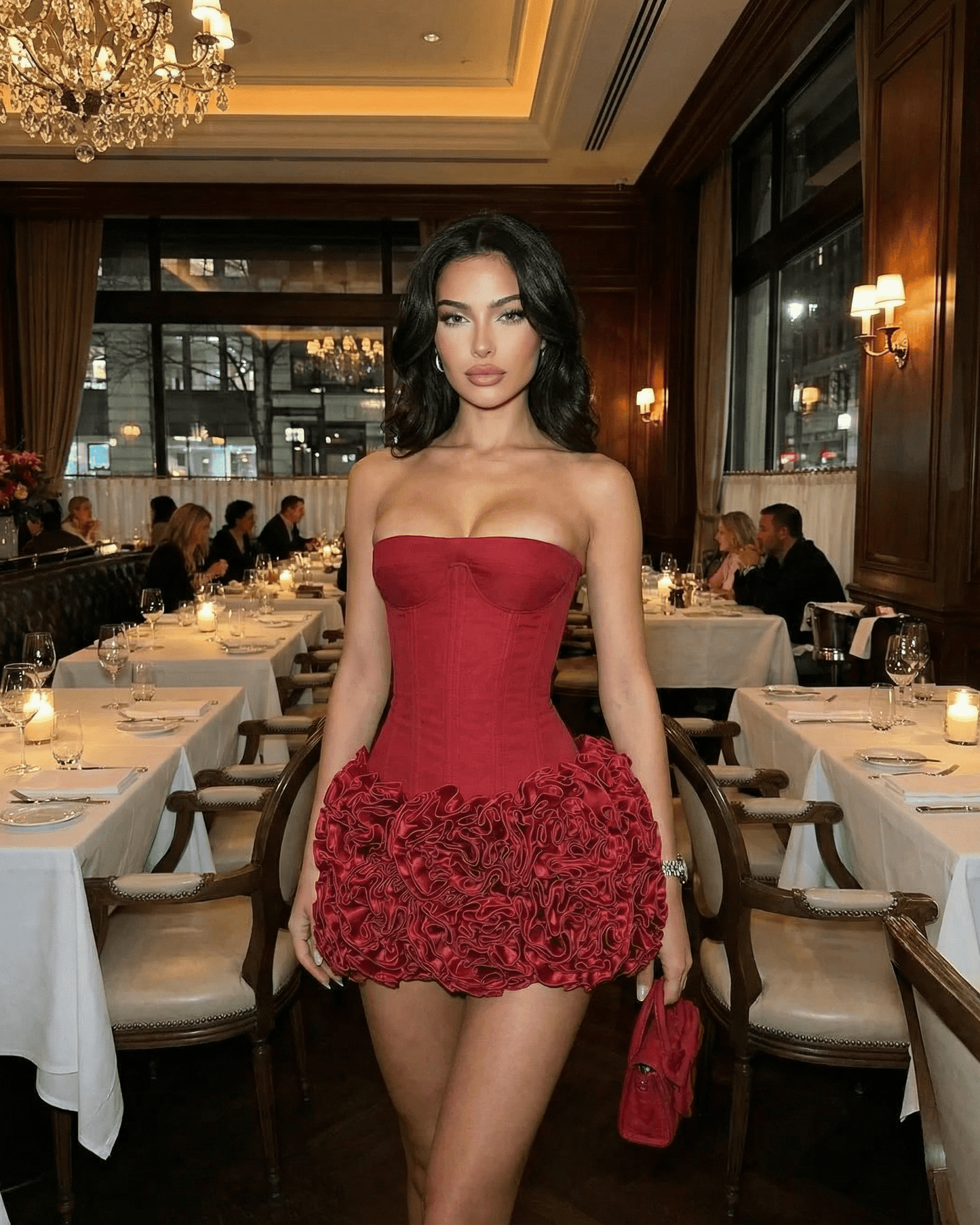 Siena Mini Dress by Slimona - Strapless corset style with textured red mini skirt in a chic restaurant setting.