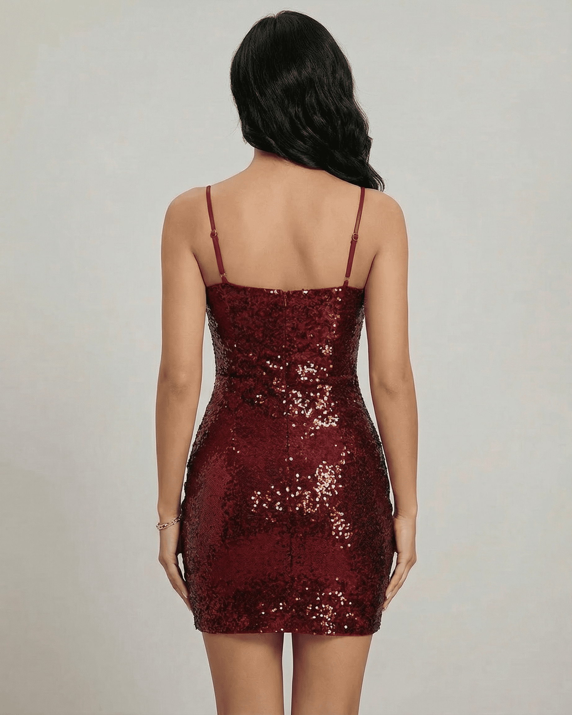 Back view of Verona Mini Dress by Slimona, showcasing sequin detail and fitted silhouette.