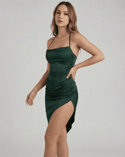 Selene Midi Dress by Slimona featuring a sleek satin silhouette and elegant pleating in green.