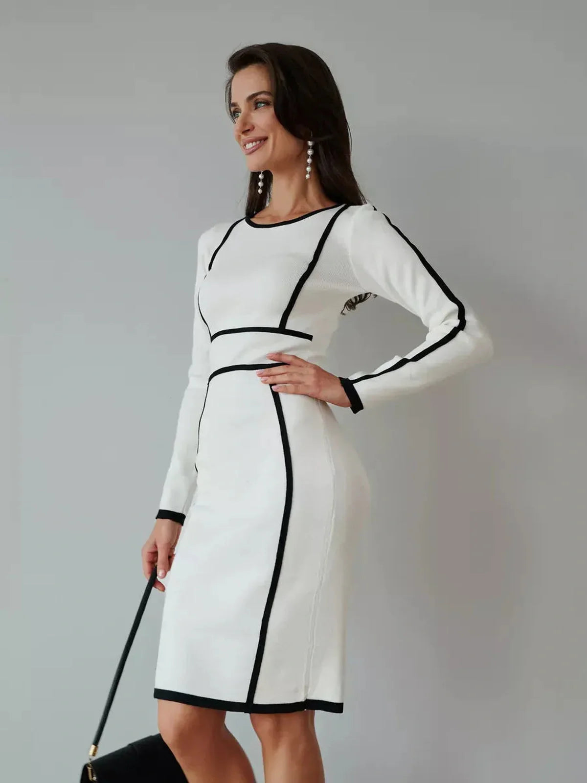 Framed Elegance Midi Dress in white with black piping, perfect for weddings, proms, and formal events.