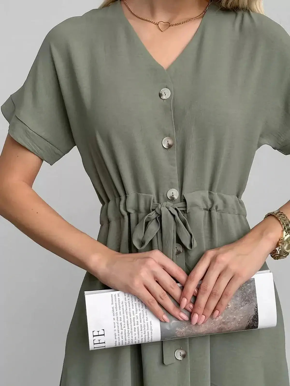 Elegant khaki Botany Midi Dress with V-neck and cinched waist, perfect for summer and special occasions.