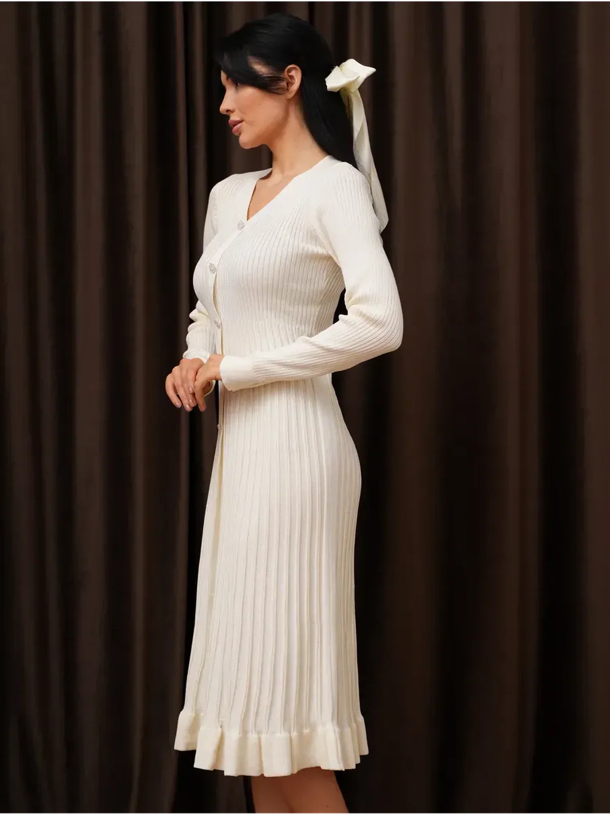 Elegant Pearl Knit Midi Dress with V-neckline and crystal buttons, perfect for weddings and special occasions.