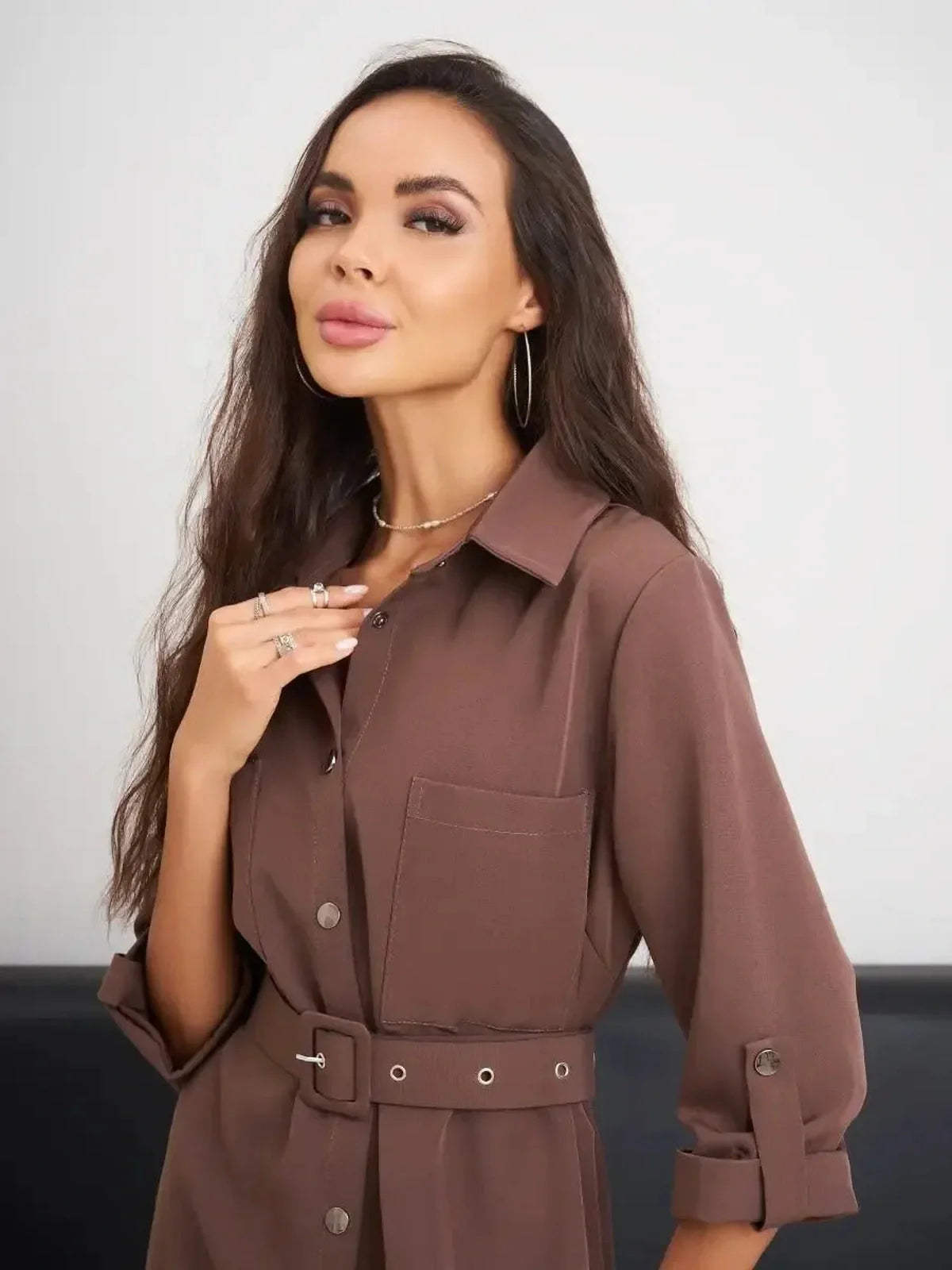 Chic Café Edit mini dress in brown with a tailored fit, button-down front, and oversized pockets, perfect for summer occasions.