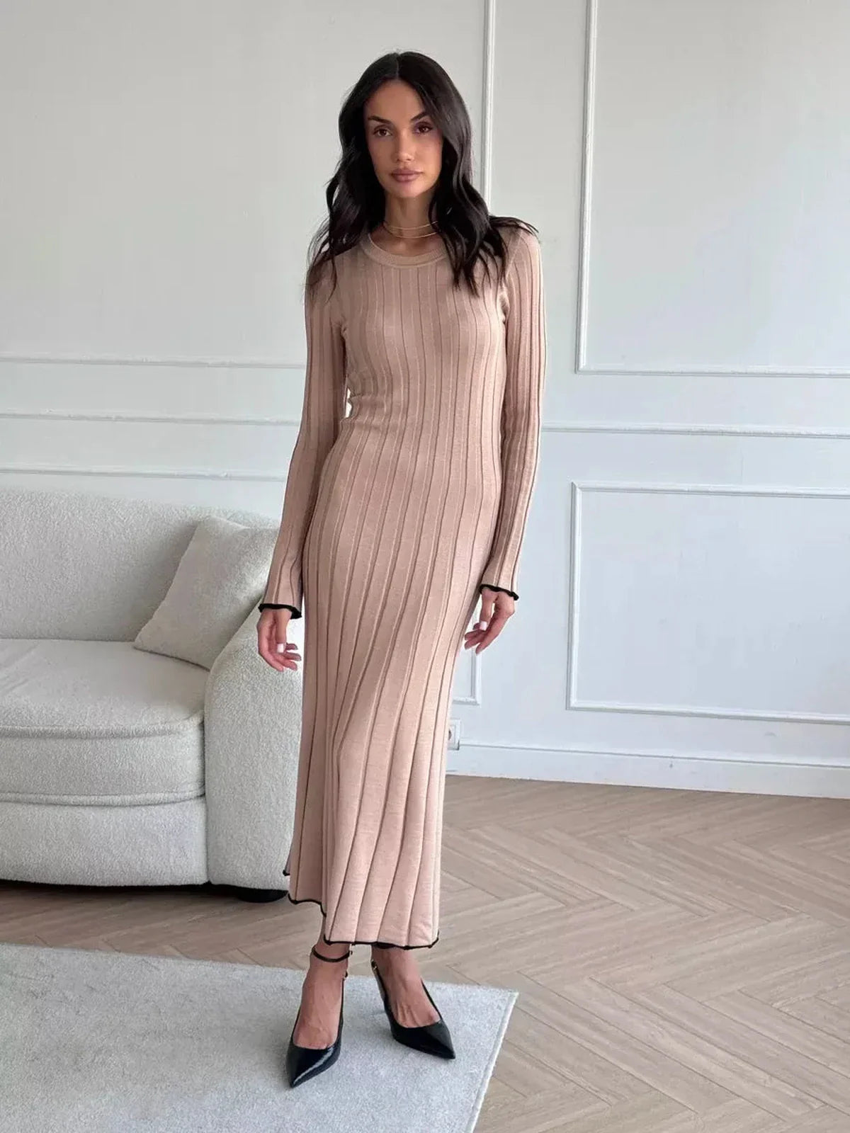Sahara Curve Maxi Dress in Sandstone Beige, featuring a soft ribbed texture and elegant full-length silhouette.