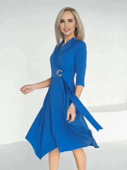 Sapphire Flow Midi Dress in royal blue featuring a tailored wrap silhouette and metallic waist detail, ideal for formal occasions.