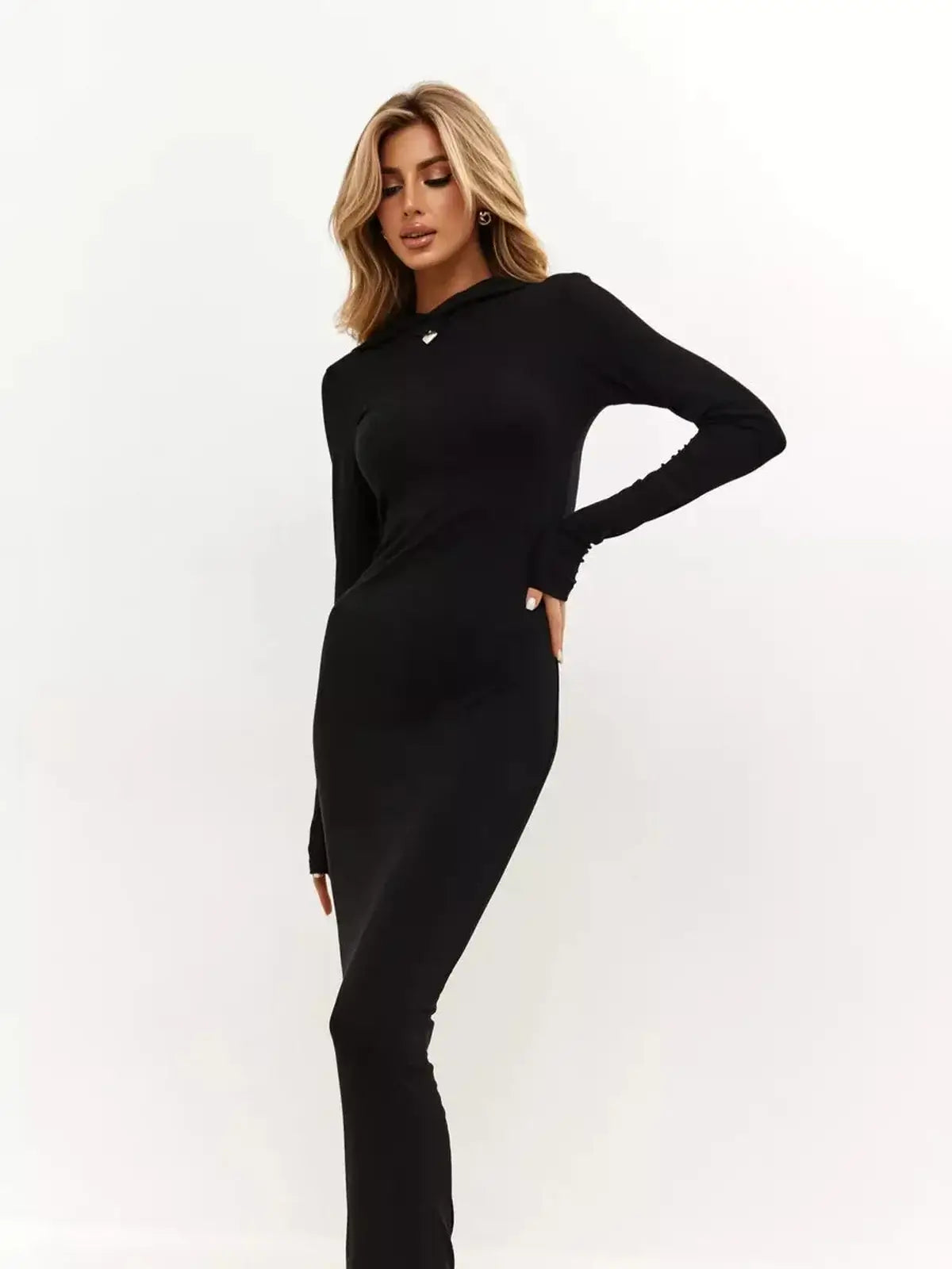 Noir Maxi Dress: Sleek black dress with hood, long sleeves, and fitted design for modern elegance.