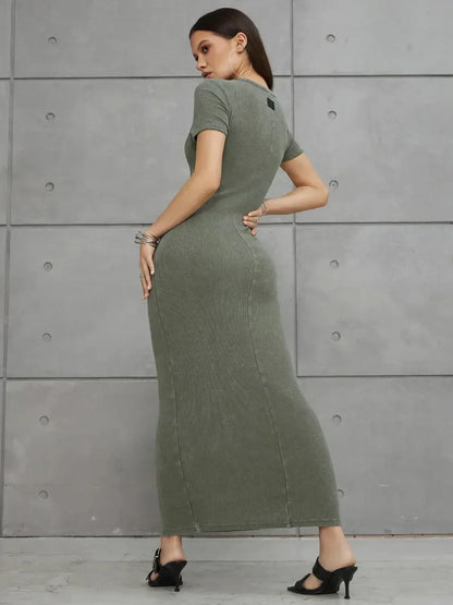 Olive Line Maxi Dress in khaki green ribbed cotton, featuring a form-hugging silhouette and short sleeves.