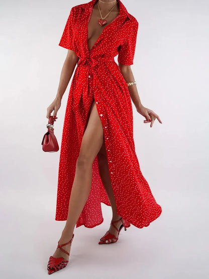 Model showcasing the vibrant Scarlet Dot Midi Dress with playful polka dots, featuring a cinched waist and flowing A-line silhouette.