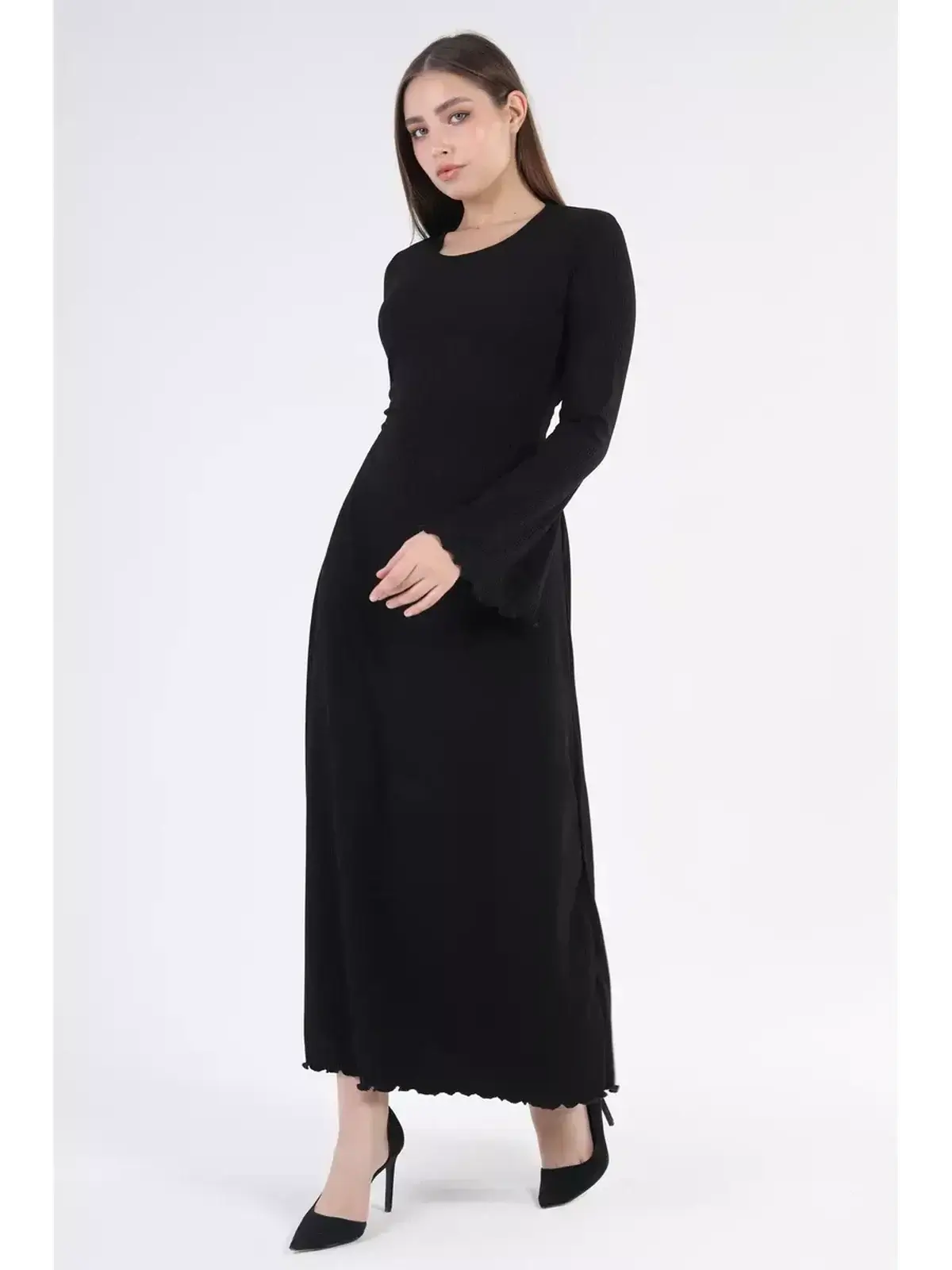 Elegant black flare midi dress with statement sleeves, perfect for formal events and wedding guest attire.