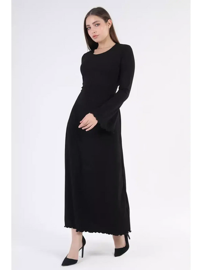 Elegant black flare midi dress with statement sleeves, perfect for formal events and wedding guest attire.