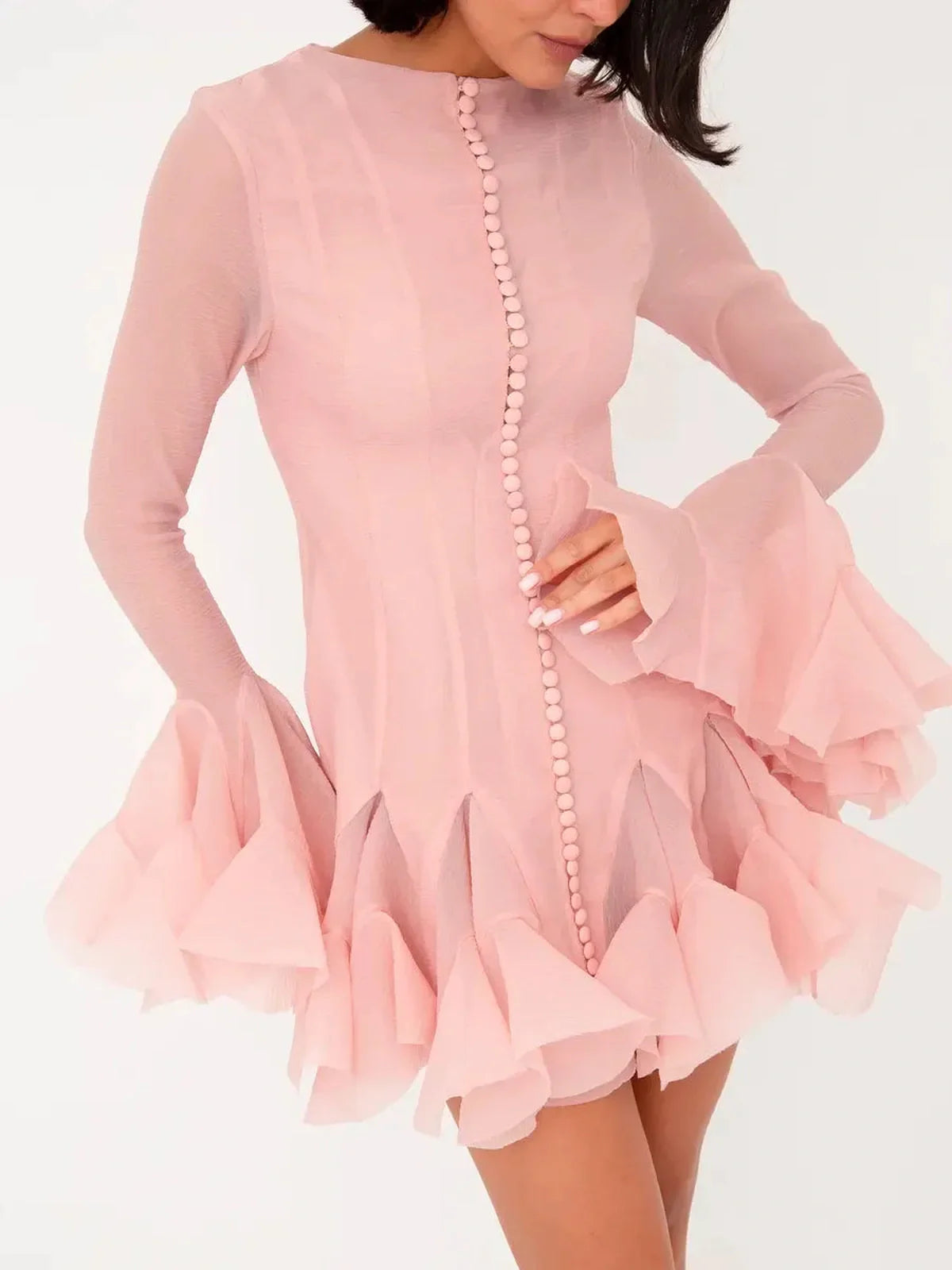 Rose Whirl Mini Dress showcasing elegant pink chiffon with flounced sleeves and pleated hem, perfect for festive occasions.