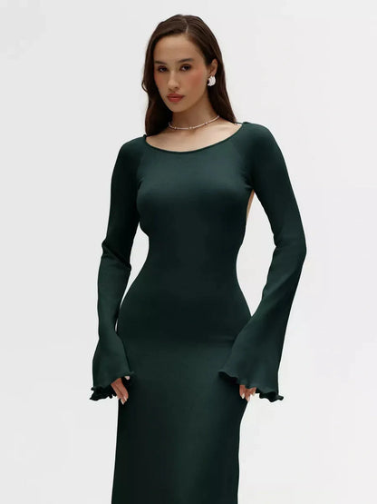 Serenity Knit Midi Dress in dark green with open back and flounced sleeves, perfect for weddings and evening events.
