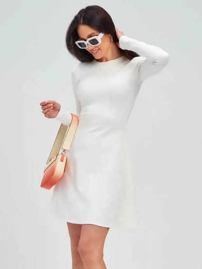 Ivory Sculpt Dress, a minimalist white dress featuring a fitted bodice and flared A-line skirt, perfect for summer occasions.