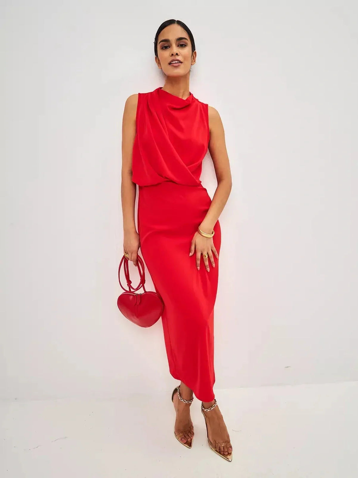 Red Drape Maxi Dress featuring a chic sleeveless design and elegant draped silhouette for weddings and formal events.