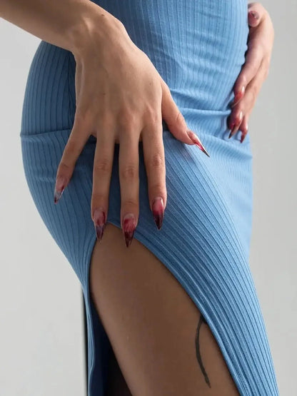 Close-up of the Ocean Lace Midi Dress highlighting the ribbed texture and bold side slit, perfect for summer occasions.