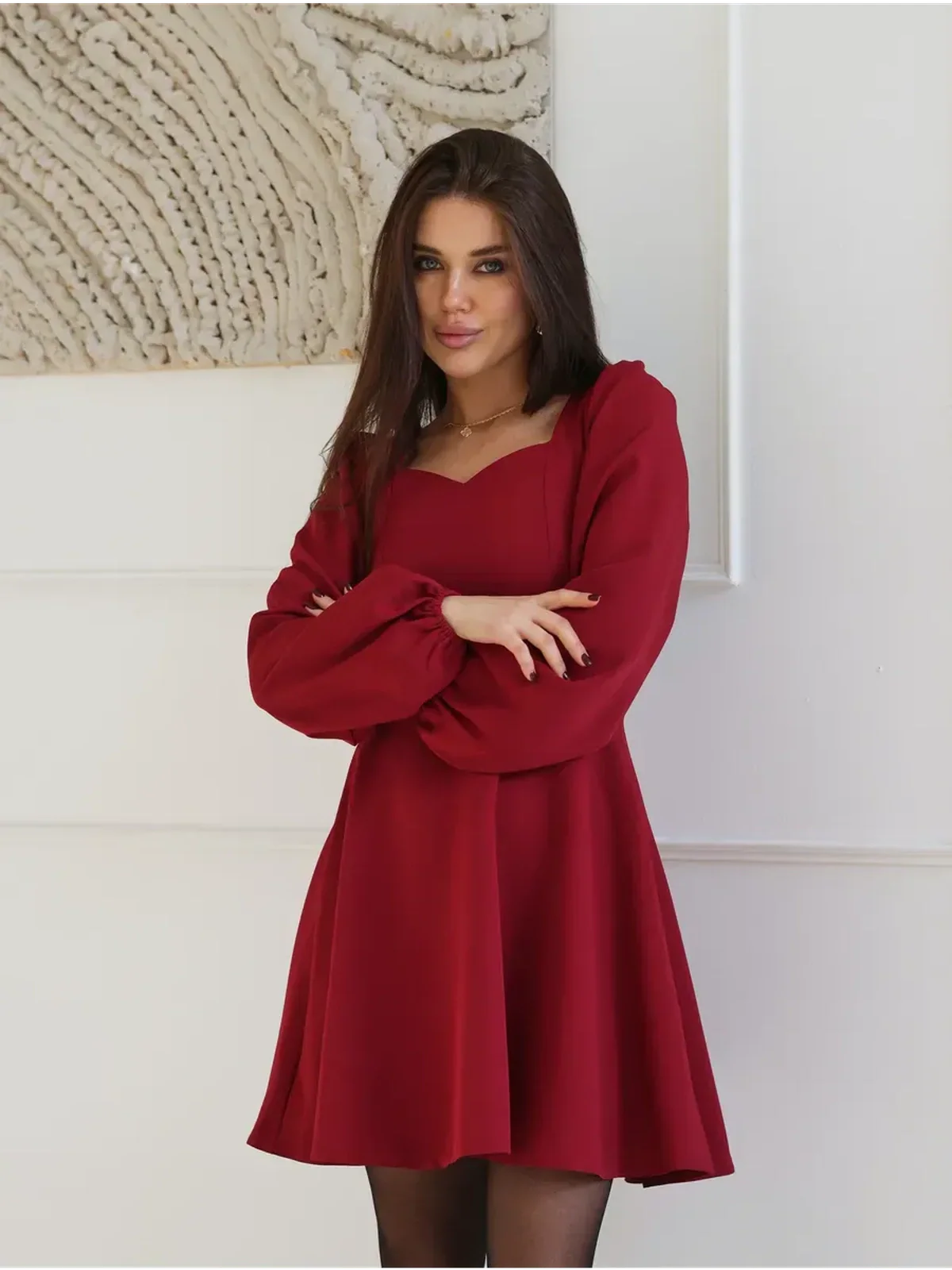 Ruby Flare red mini dress with sweetheart neckline and long sleeves, perfect for weddings and formal occasions.