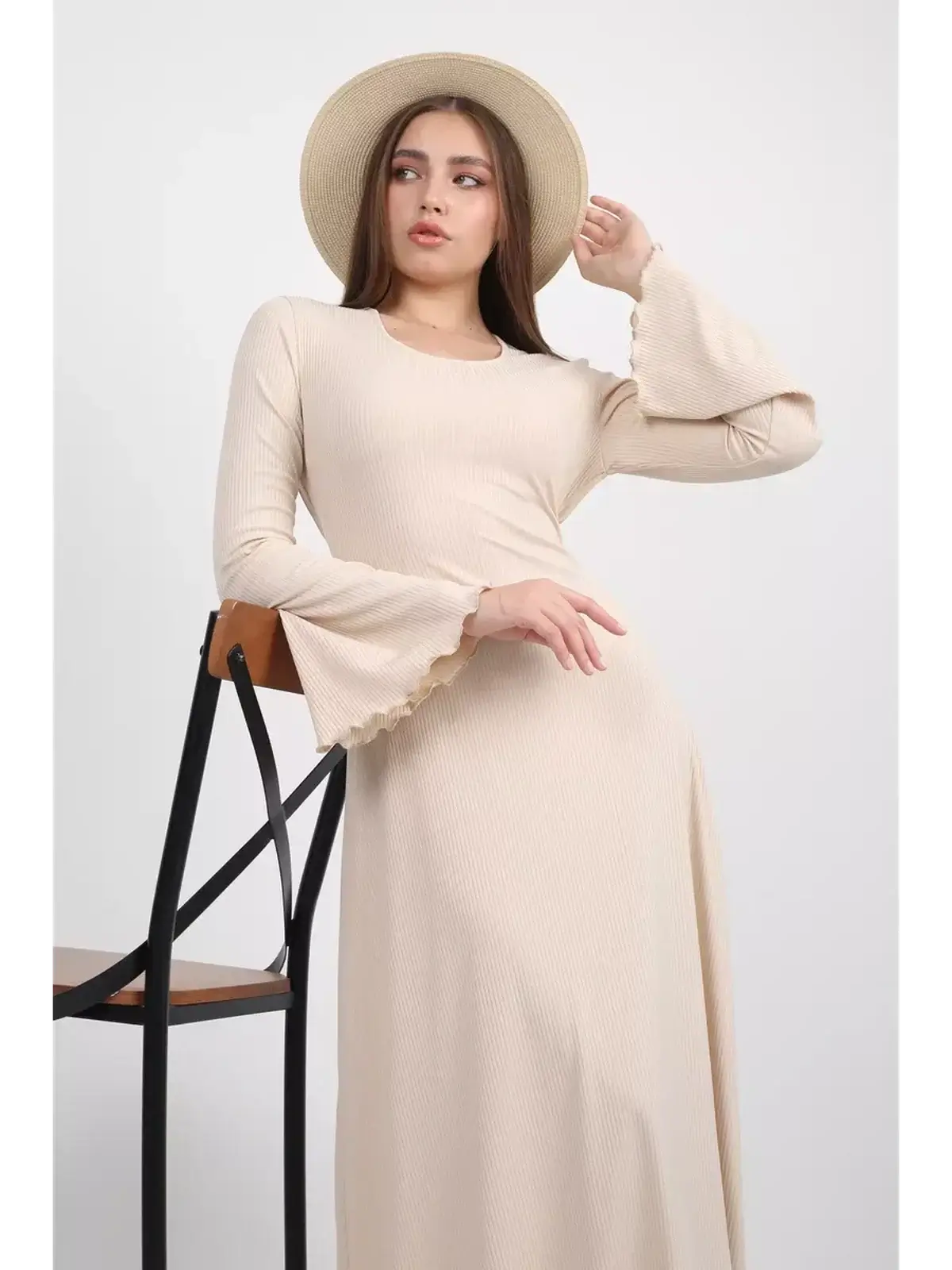 Ivory Flow Midi Dress featuring bell sleeves and a soft ribbed texture, perfect for summer weddings and formal occasions.