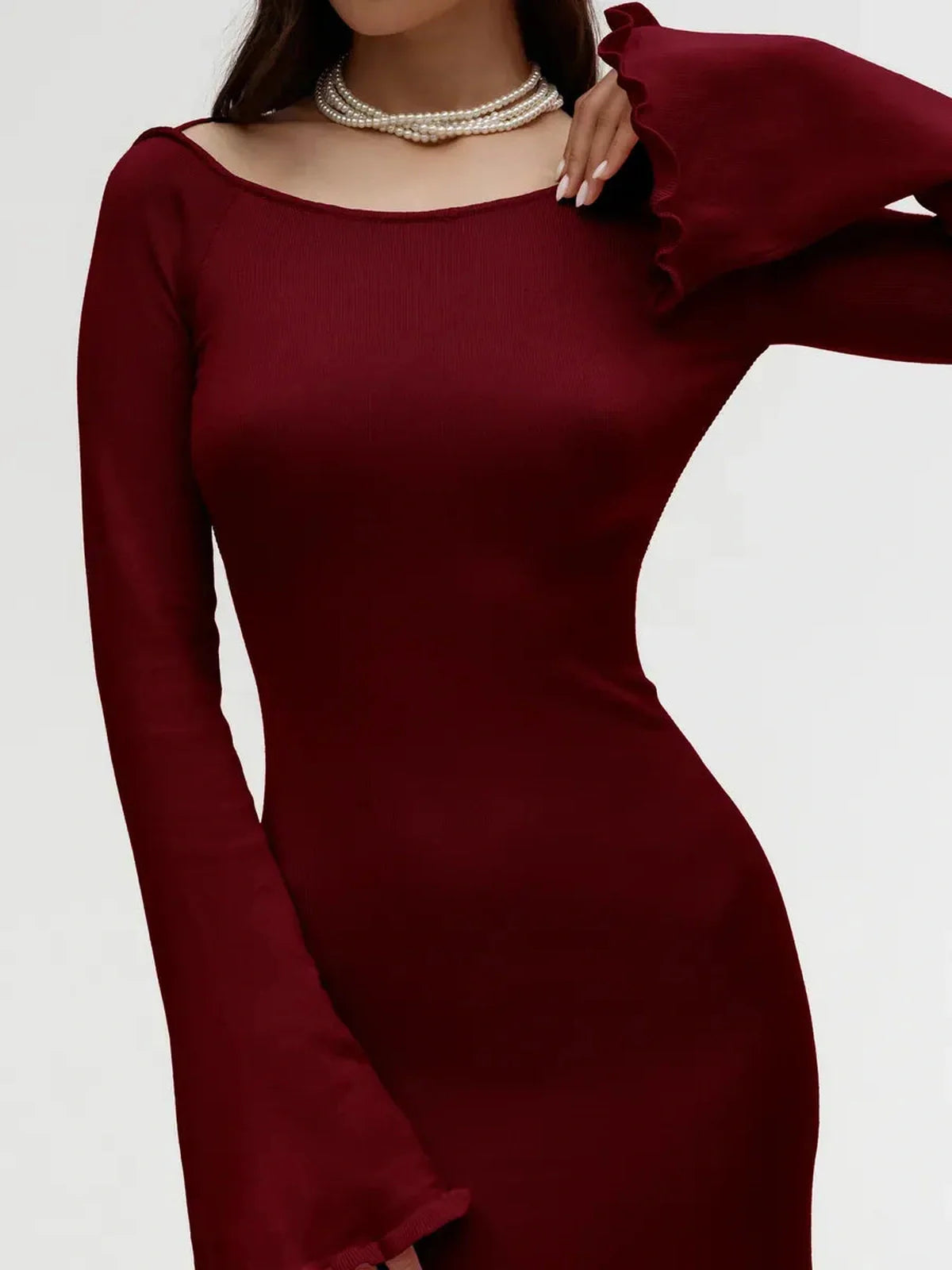 Elegant burgundy ruffle-back midi dress with long sleeves, perfect for weddings and formal occasions.