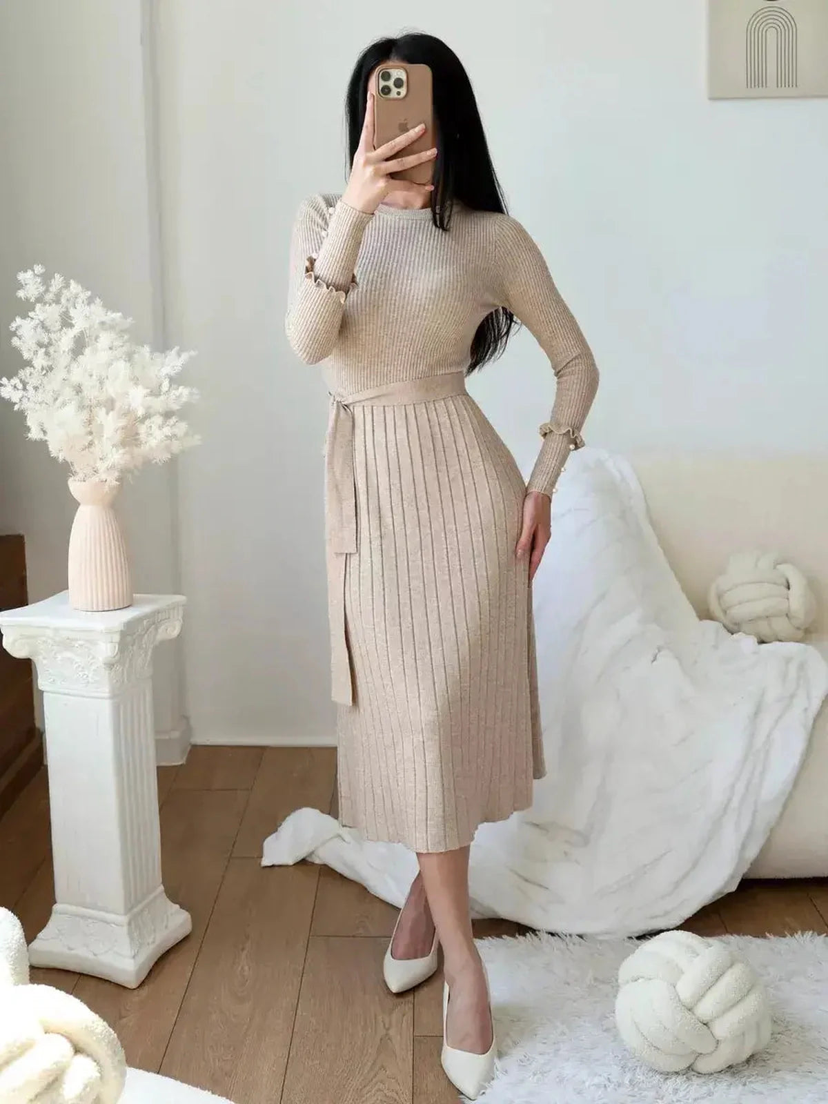 Serene Knit Midi Dress in ribbed texture with waist tie and long sleeves, perfect for elegant occasions.