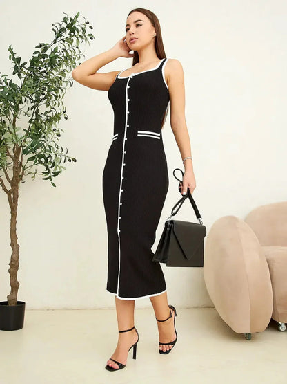 Refined Lines Midi Dress in black with contrast piping, showcasing a sleek silhouette ideal for formal and casual events.