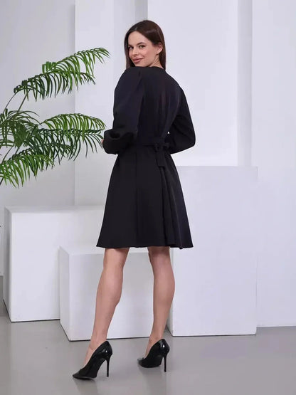 Elegant black mini dress with wrap silhouette and detachable belt, perfect for weddings and formal occasions.