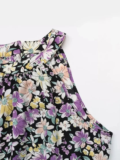 Close-up of the floral halter neckline of the Botanic Bloom Midi Dress in lightweight fabric.
