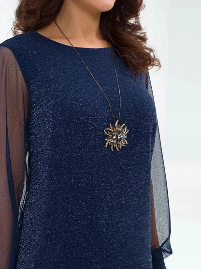 Close-up of the Celeste Midi Dress featuring sheer sleeves and a sparkling navy blue fabric, ideal for evening events.