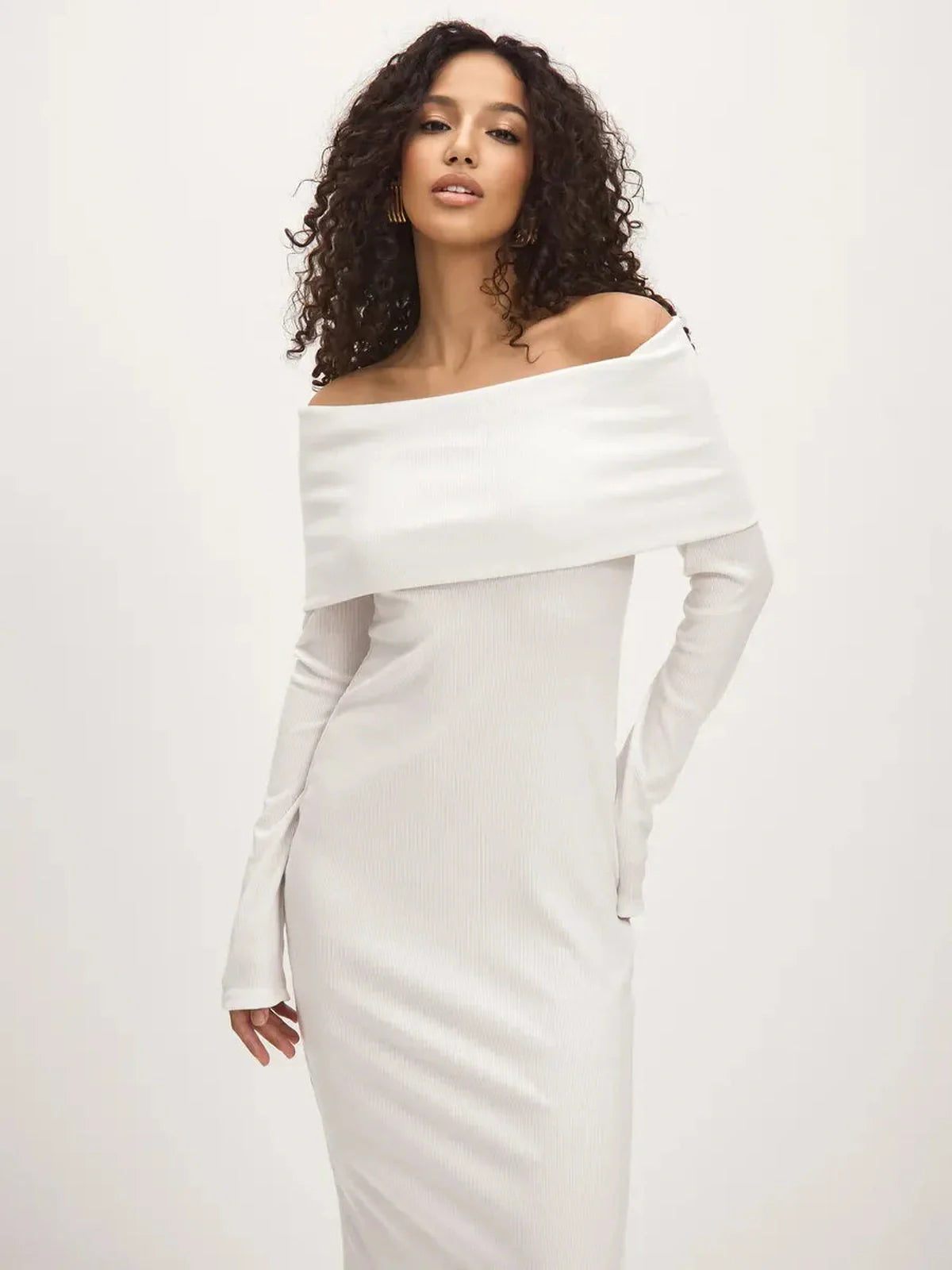 Sculpted Grace Maxi Dress featuring an off-shoulder silhouette and side slit, ideal for weddings and formal events.