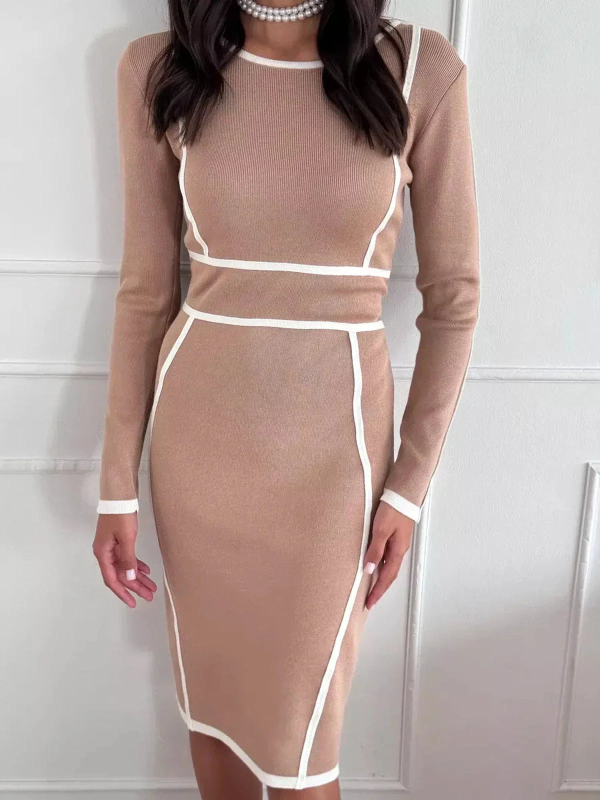 Outline Midi Dress in soft sand with white contrast trim, perfect for weddings and cocktail events.