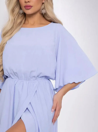 Close-up of the Grace Flutter Midi Dress showcasing flowing sleeves and a cinched waist, perfect for summer events.