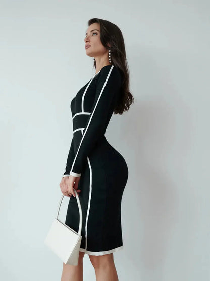 Elegant black Midi Dress with white paneling, perfect for cocktail events and casual summer outings.