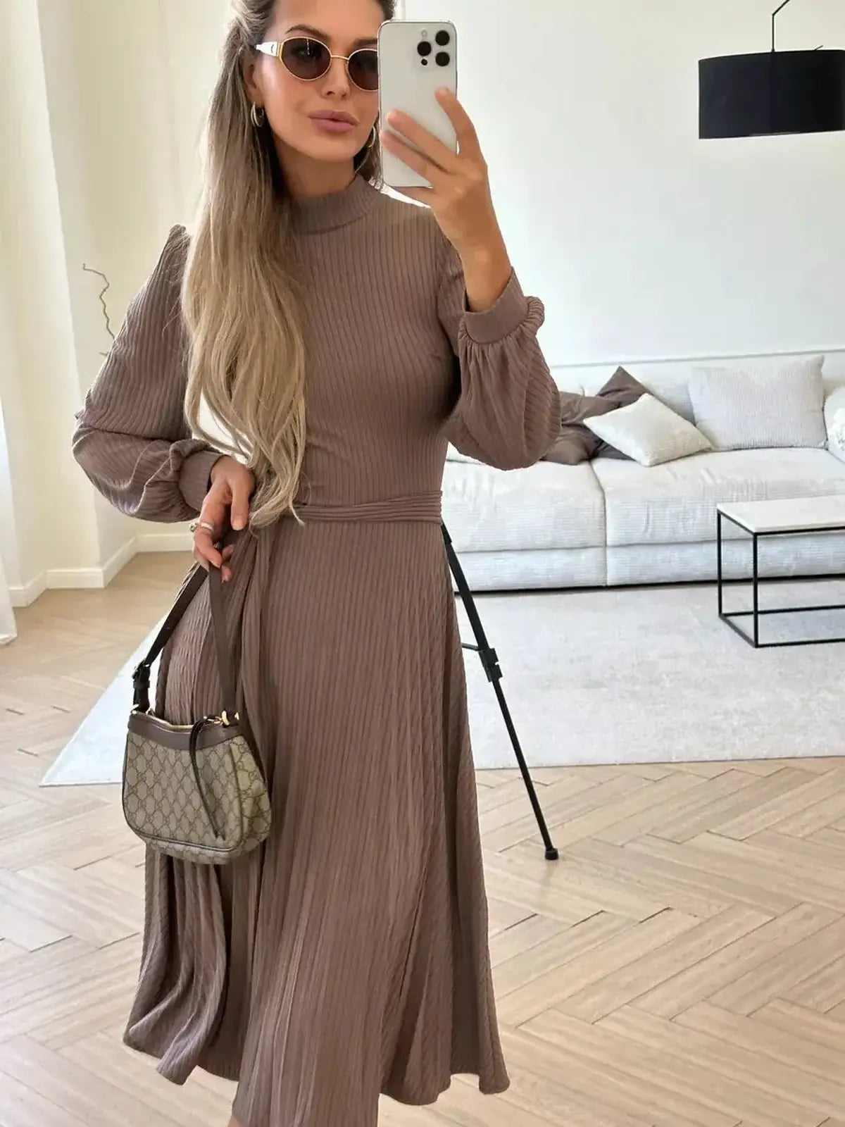 Plissé Charm Midi Dress in rich coffee hue, featuring a pleated skirt and mock neckline, ideal for weddings or formal events.