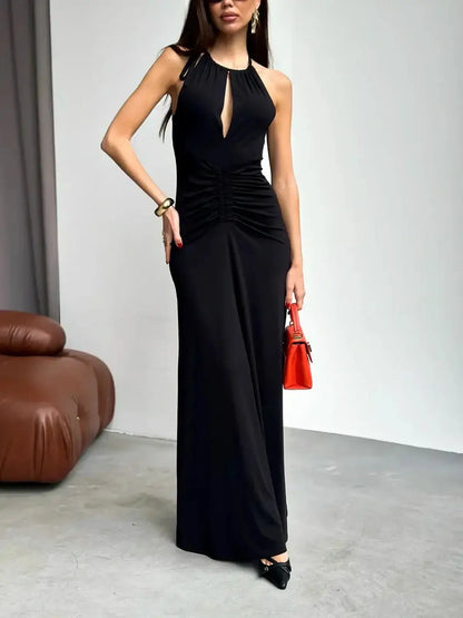 Elegant black maxi dress with ruched halter design, front slit, perfect for weddings, proms, or summer soirées.