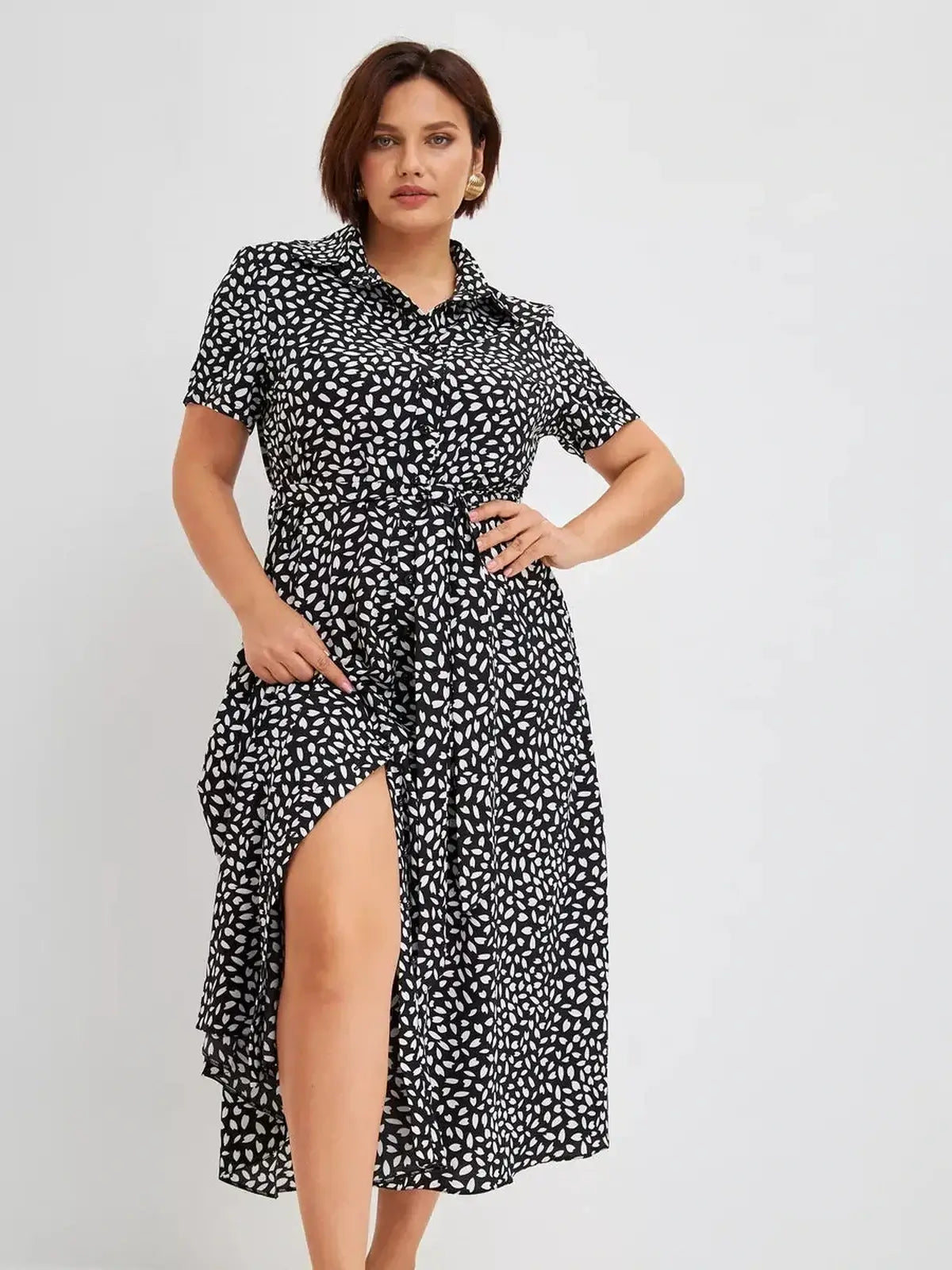 Monaco Midi Dress in black and white print featuring a shirt-dress silhouette, perfect for casual or formal occasions.