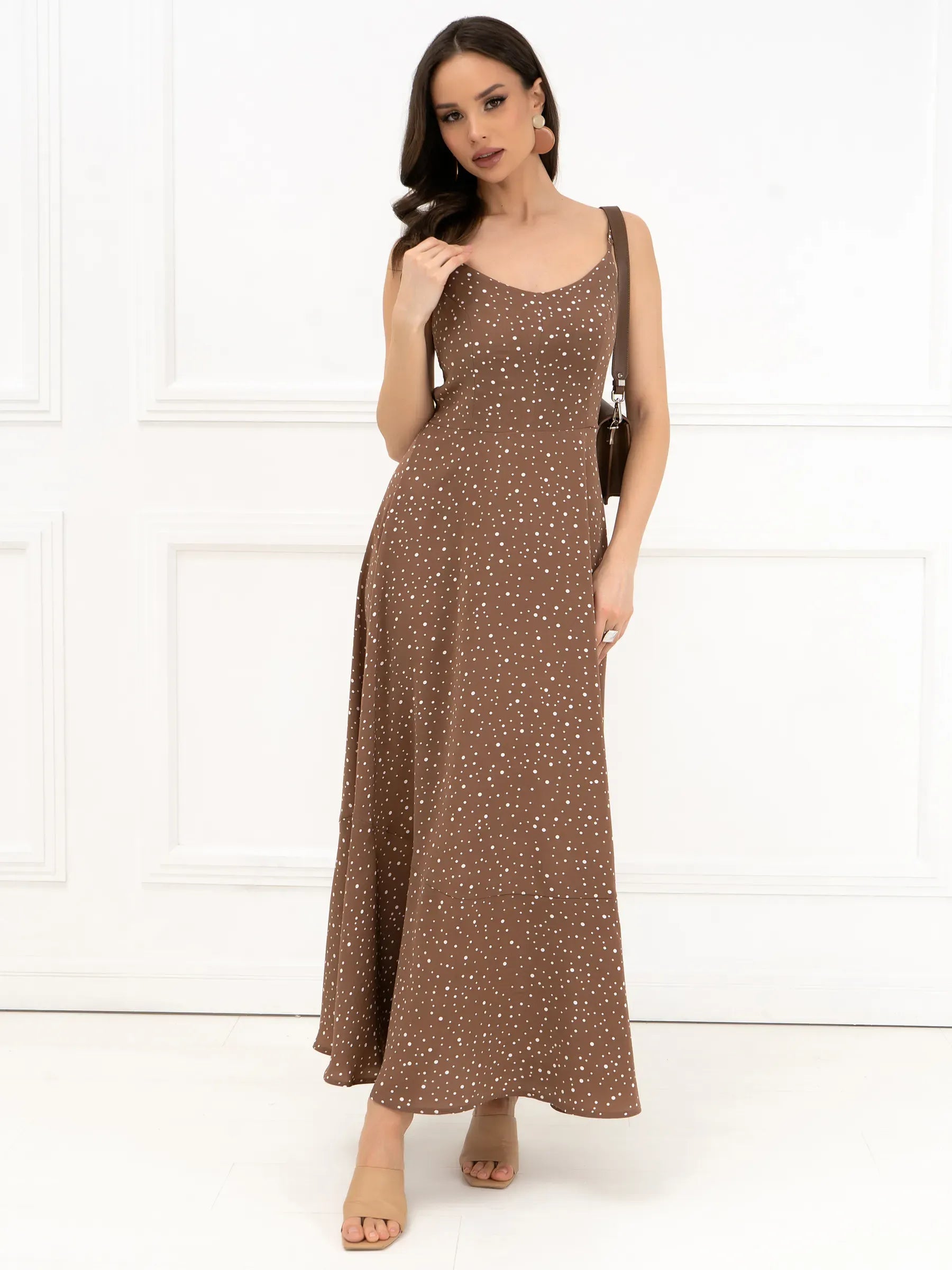 Polka Bow Maxi Dress in brown with polka dots, ideal for summer weddings and casual outings, featuring a flowing A-line silhouette.