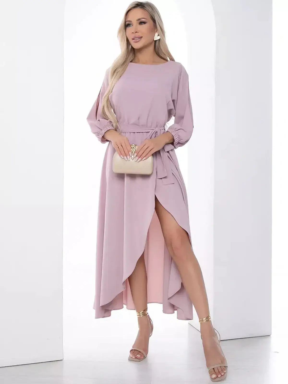 Blush Aura Midi Dress featuring a graceful silhouette, shoulder cut-outs, and a stylish slit, perfect for wedding and formal occasions.
