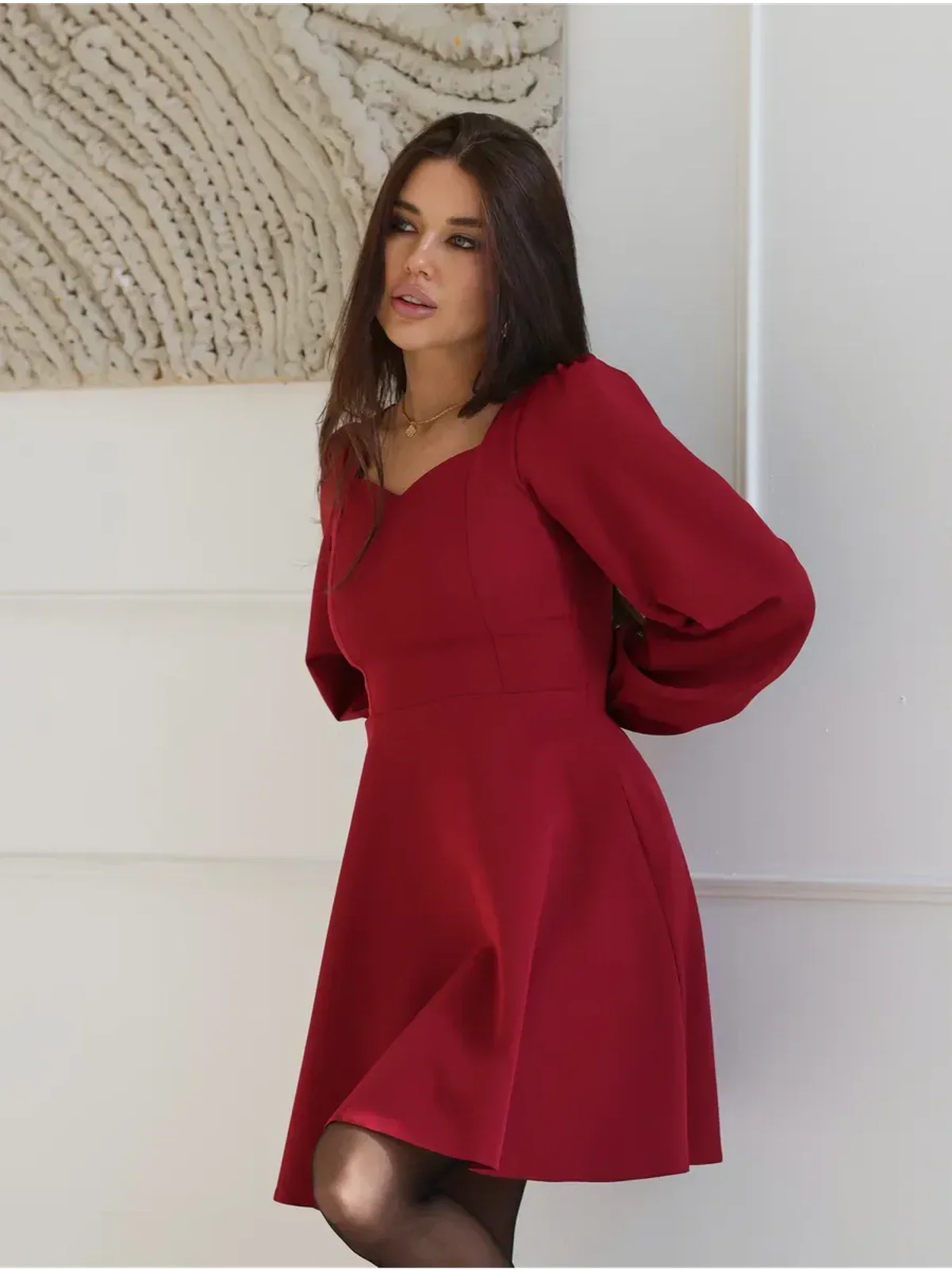 Ruby Flare red dress featuring a romantic sweetheart neckline and flared skirt, perfect for weddings and formal events.